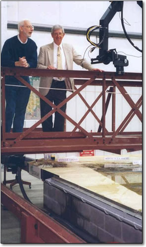 WAFB-TV reporter Allen Tumey interviews DNR Assistant Secretary Hanchey