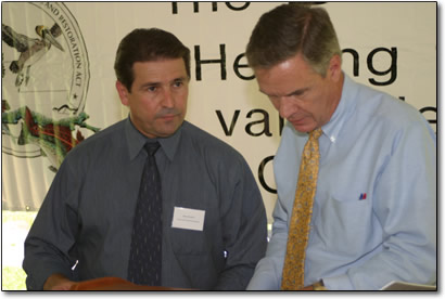 U.S. Senator John Breaux and Plaquemines Parish President Benny Rousselle prepare for dedication ceremony.